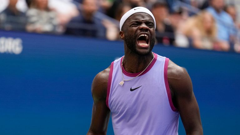 Frances Tiafoe, of the United States, reacts after scoring a point against Ben Shelton, of the United States, during the third round of the U.S. Open tennis championships, Friday, Aug. 30, 2024, in New York. (AP Photo/Seth Wenig)