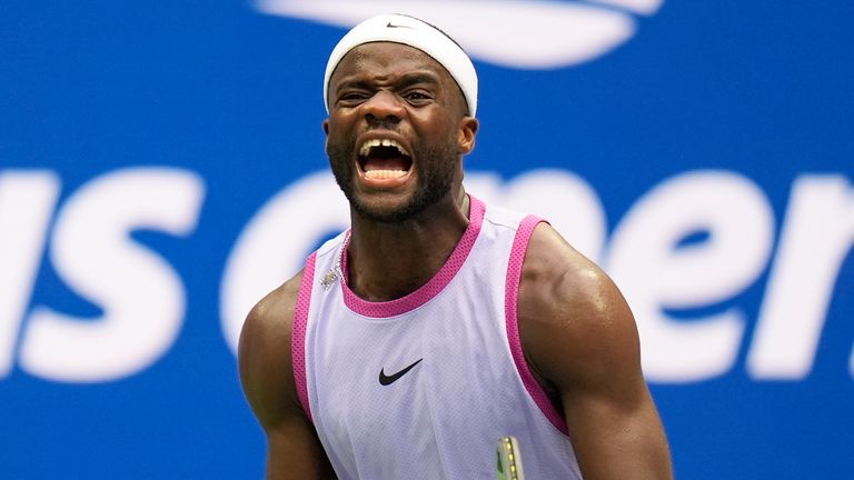 Frances Tiafoe, of the United States, reacts during a match against Ben Shelton, of the United States, during the third round of the U.S. Open tennis championships, Friday, Aug. 30, 2024, in New York. (AP Photo/Seth Wenig)