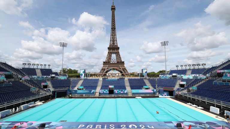 The venue near the Eiffel Tower where beach volleyball was held during the Olympics is converted to blind football venue for the Paralympics (Associated Press)